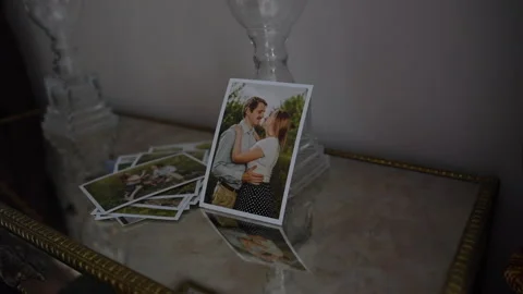 Photo of a couple on the table Stock Footage 278406539