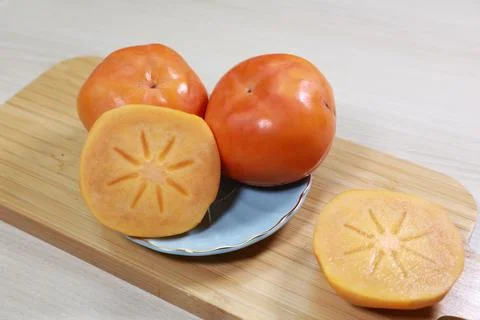Photo of crispy persimmon Stock Photos
