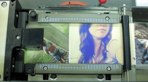 Photo Cutting Machine, Automated machinery, Photo conveyor Stock Footage 59792656