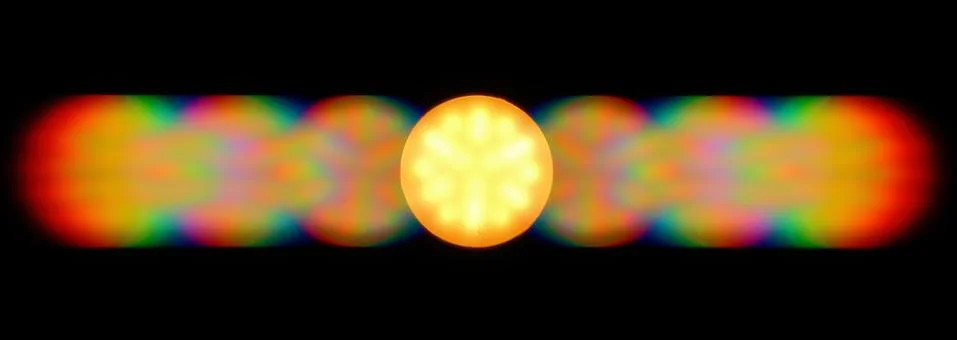 Photo of the diffraction pattern of LED lamp light Foto stock
