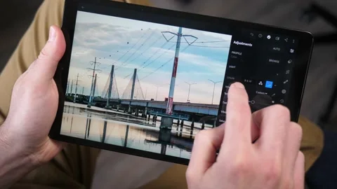 Photo Editing Using a Tablet and a Photography App Stock-Footage 147000423