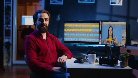 Photo editor vlogging, doing tutorial on how to use editing software to retouch Stock Footage 257500711