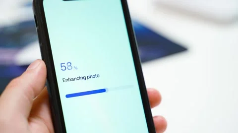 Photo enhancing progress bar stops at 70 percent on smartphone screen Stock Footage 342603145