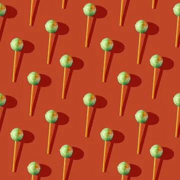 Photo in the form of a seamless pattern. Candy on a stick with shadows on a Stock Illustration