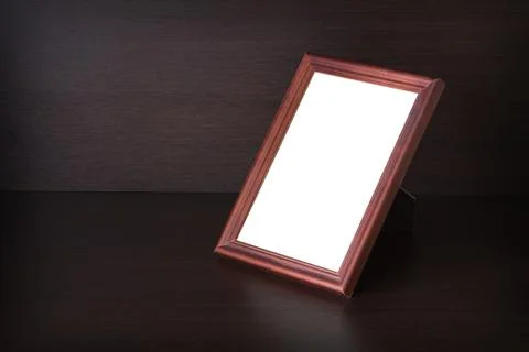 Photo frame standing on the table Stock Photos