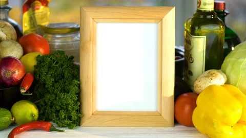Photo frame on the vegetable background 4K Stock Footage 85175221