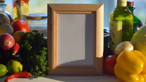 Photo frame on the vegetable Stock Footage 85175354