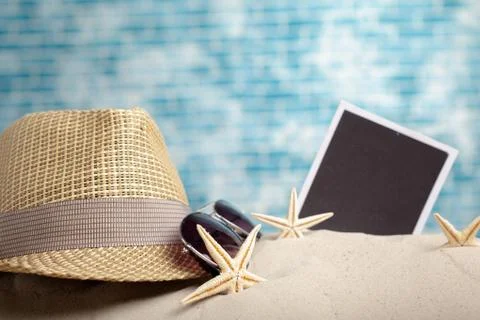 Photo frames on the beach with seashells around Stock Photos