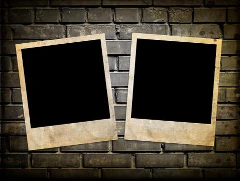 Photo frames on the brick wall Illustrazione stock