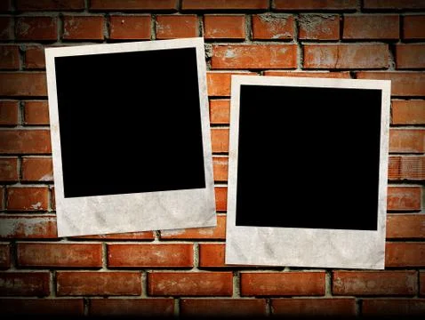 Photo frames on the brick wall 库存插图