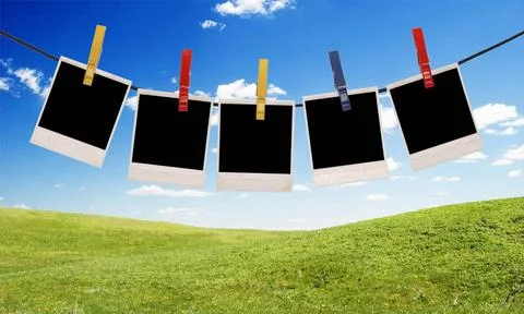 Photo frames empty photo frames over sky background ,model released, Symbo... Stockfoto's