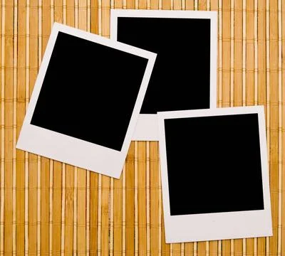  photo frames photo frames against wooden backgound Copyright: xZoonar.com... Stock Photos