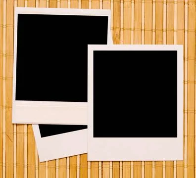  photo frames photo frames against wooden backgound Copyright: xZoonar.com... Stock Photos