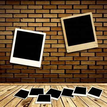Photo Frames Photo Frames at Brick Wall and Wooden Floor Copyright: xZoona... Stock Photos