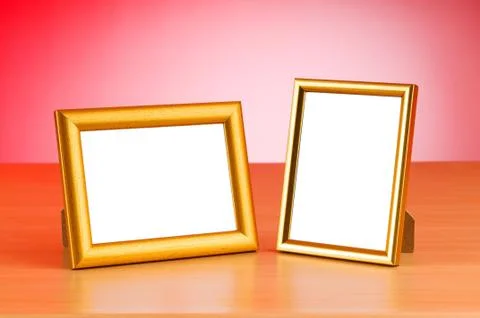 Photo frames on the table Stock Photos
