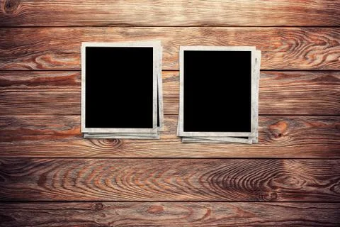 Photo frames on wooden background Stock Illustration