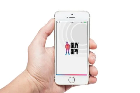 Photo of a hand using guy spy app on iphone 5s 스톡 사진