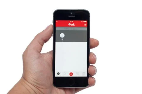 Photo of a hand using path app on iphone 5s 写真素材