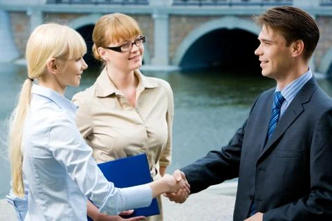 Photo of happy partners expressing trust by handshake after concluding bargain Stock Photos