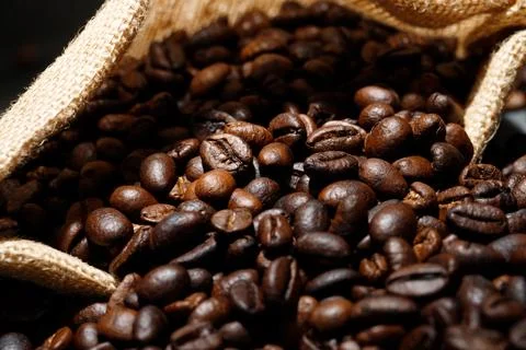 Photo macro close up texture of roasted coffee beans dark, can be used as a.. Stock Photos