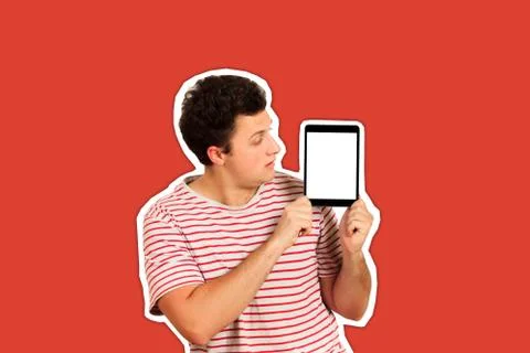 Photo of a man using tablet PC. blank white screen. emotional guy isolated Ma Stock Photos