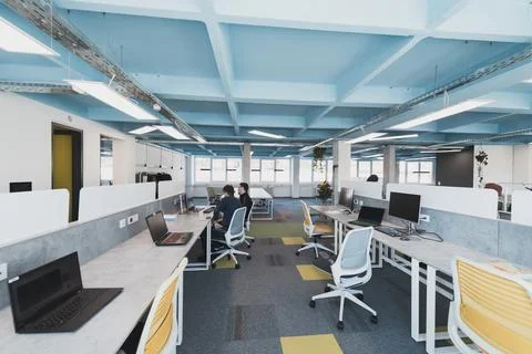 Photo of a modern office where programming, digital marketing and web design Stock Photos