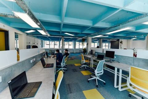 Photo of a modern office where programming, digital marketing and web design Stock Photos