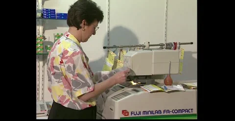 Photo Processing Machine Developing Prints – 1990s Stock Footage 318947268