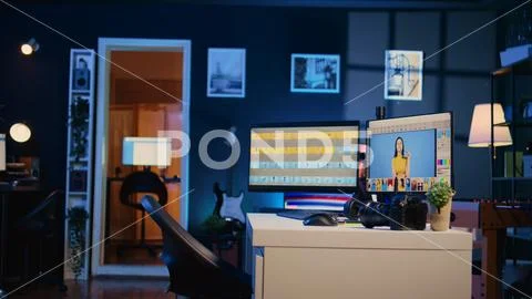 Photo retouching software interface on computer in empty post production studio Stock Photos