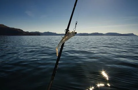 Photo of rod and reel are ready to fish on a fishing vacation in Selje, Norway, Stock Photos