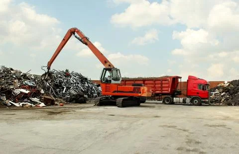 Photo of a small workshop loading cranes on a trailer Stock Photos