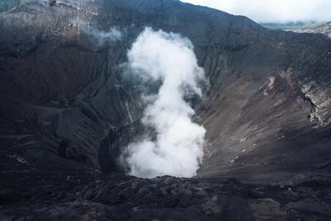 Photo of smoke volcano crater on Java island Stock Photos