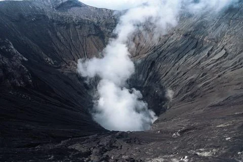 Photo of smoke volcano crater on Java island Stock-Fotos