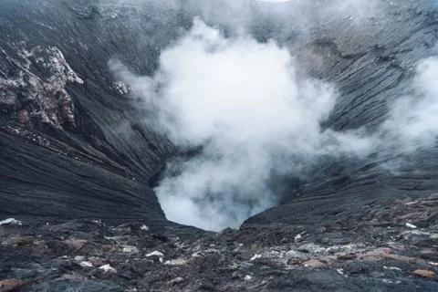 Photo of smoke volcano crater on Java island Stock Photos
