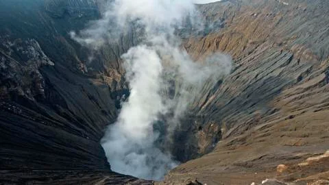 Photo of smoke volcano crater on Java island Stock Photos