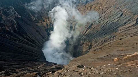 Photo of smoke volcano crater on Java island Stock Photos