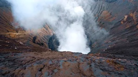 Photo of smoke volcano crater on Java island Stock Photos