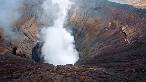Photo of smoke volcano crater on Java island Stock Photos