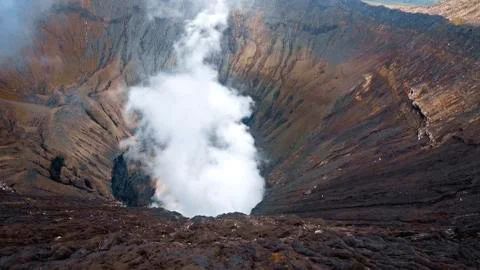Photo of smoke volcano crater on Java island Stock Photos