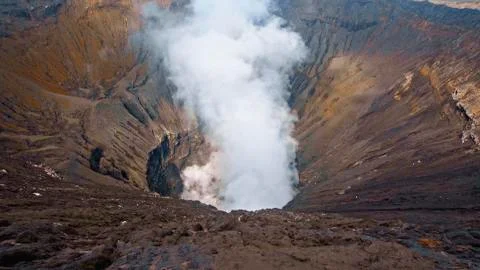 Photo of smoke volcano crater on Java island Stock Photos