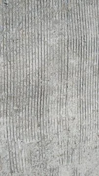 A photo of a solid concrete road with stripes texture Stock Photos