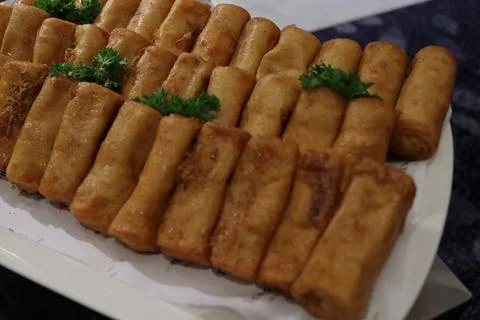 Photo of a stack of pastels or rolled cakes filled with meat Stock Photos