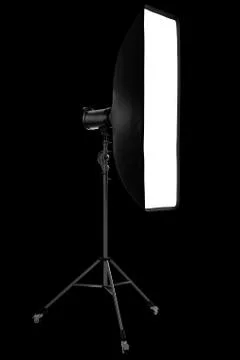 Photo studio lighting stands with flash and softbox isolated on the black. Stock Illustration