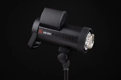 Photo studio strobe light flash bulb monoblock. Close up view of professional Stock Photos