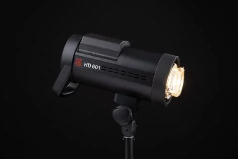 Photo studio strobe light flash bulb monoblock. Close up view of professional Stock Photos