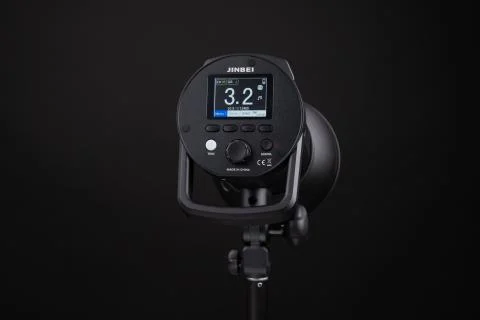 Photo studio strobe light flash bulb monoblock. Close up view of professional Stock Photos