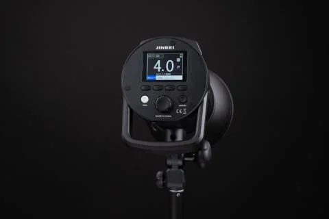 Photo studio strobe light flash bulb monoblock. Close up view of professional Stock Photos