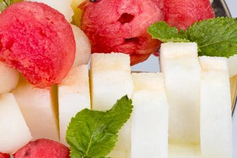 Photo of sweet fruit platter with mint Stock Photos