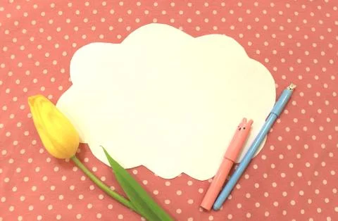 Photo of white paper in the shape of cloud on pink polka dot fabric. Backgrou Stock Illustration