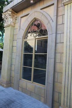 A photo of the window frames and wall of an Art Nouveau building made from .. Stock Photos